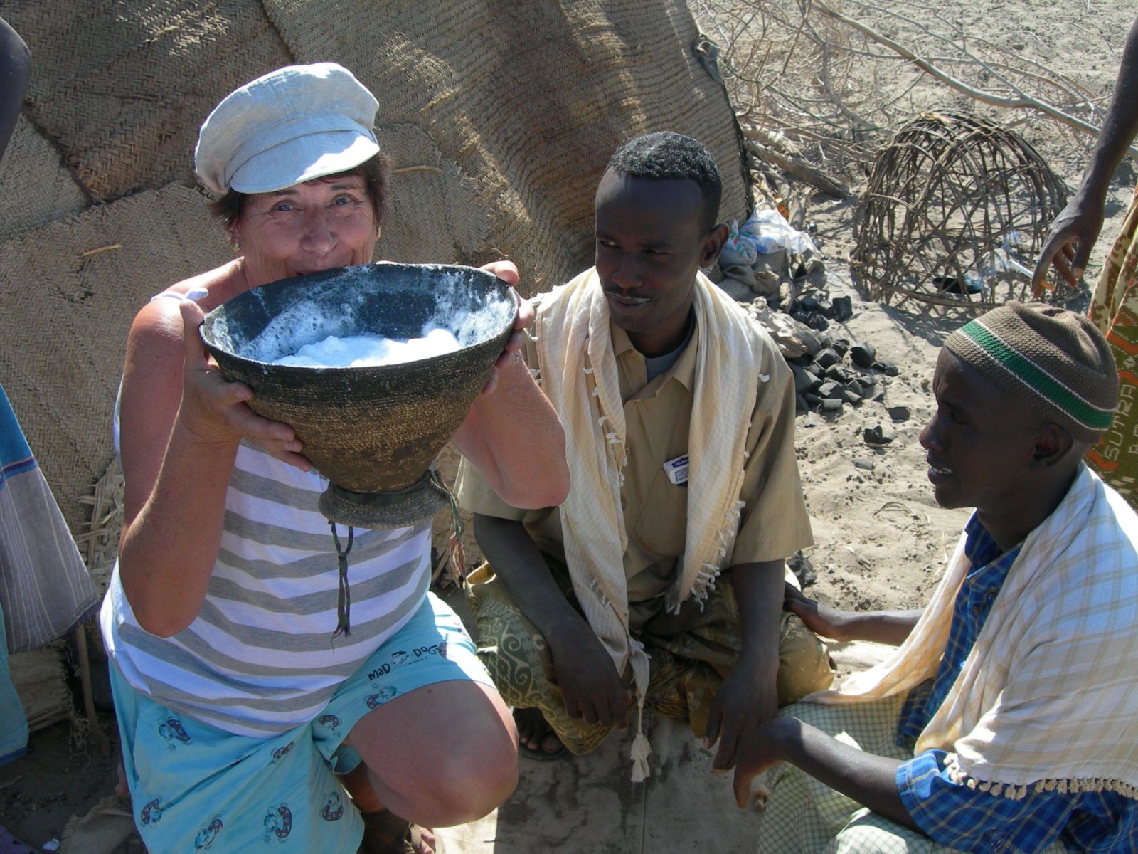 Drinking camels milk in Ethiopia